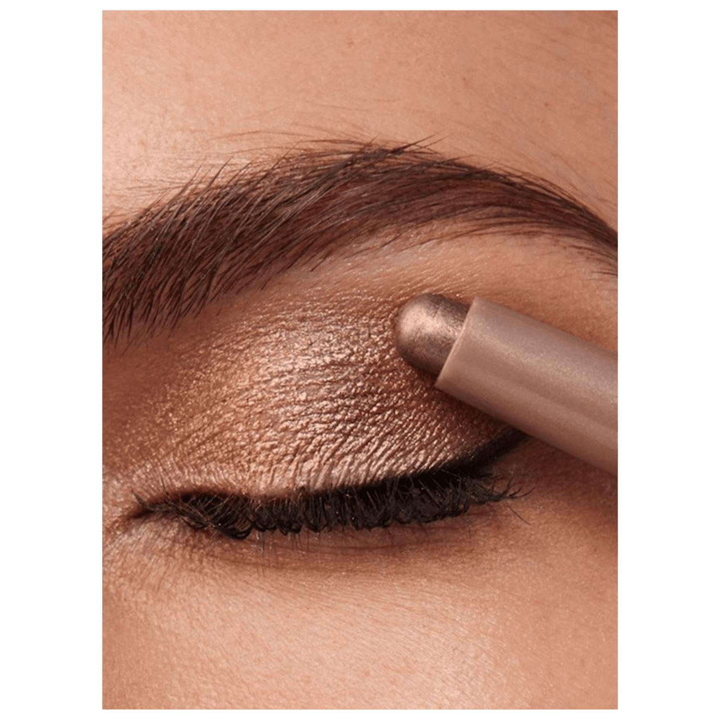 Eyebrow pencil being used on a person's eyebrow available at skintash.pk