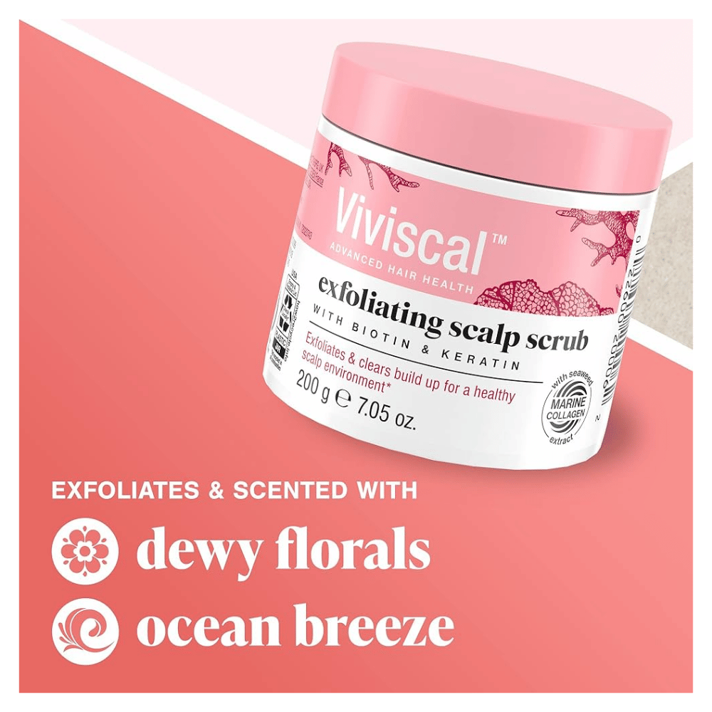 Viviscal exfoliating scalp scrub jar with pink lid on a pink background